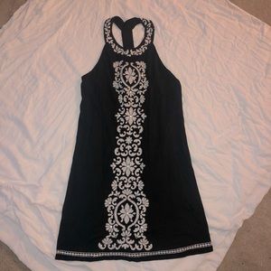 Black dress with white bead and flower details